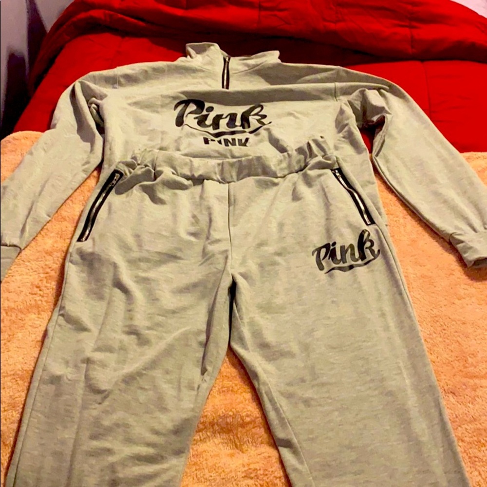 A name brand pink jogging suit